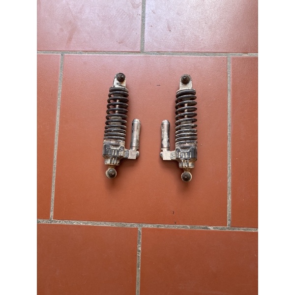 Giảm xóc xe điện cũ