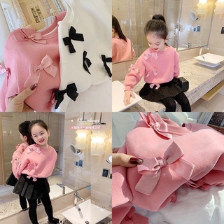 Áo da cá gắn nơ nhỏ xinh bé gái