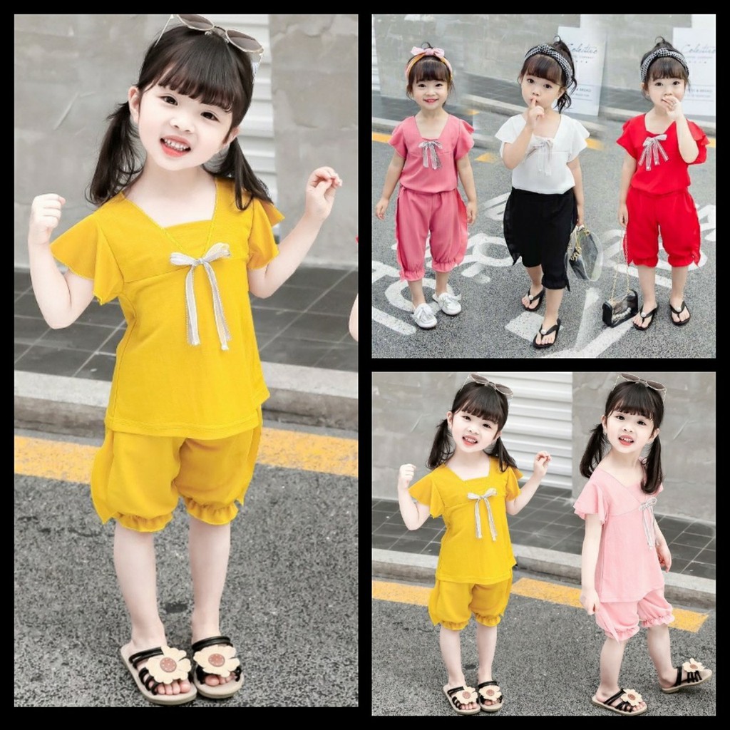 3 - Bộ bé gái màu hồng có nơ nhún viền - HG036-SM