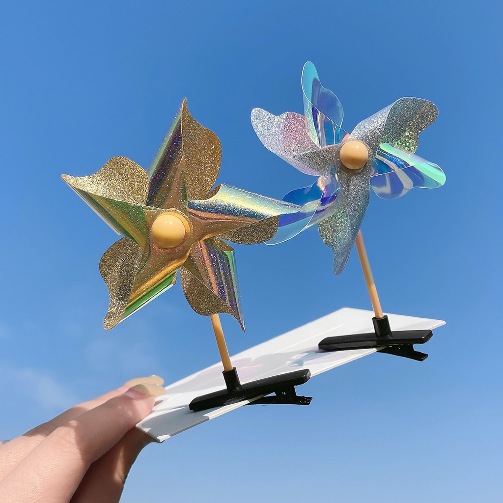 Kẹp tóc bé gái thiết kế chong chóng dễ thương có thể xoay vòng