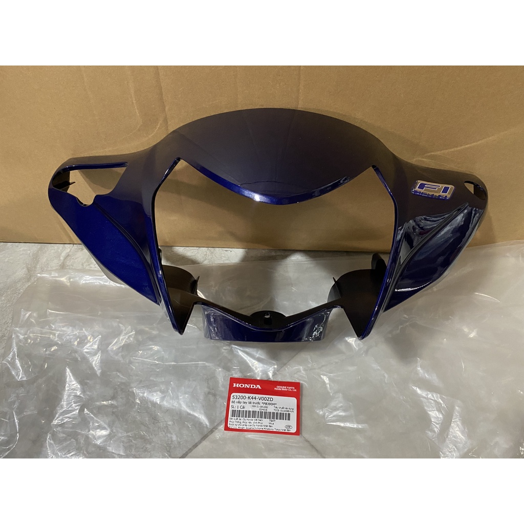 Bộ nắp tay lái trước - bàn thờ HONDA VISION mới màu Xanh đen. (53200K44V00ZD)