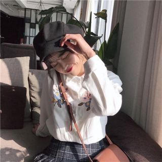 Áo sơ mi thêu hoa