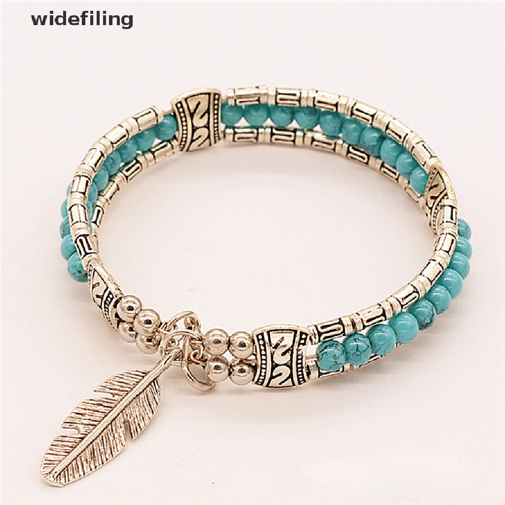 Vòng tay bạc xỏ hạt mặt dây hình lông vũ phong cách Bohemian thời trang cho nữ