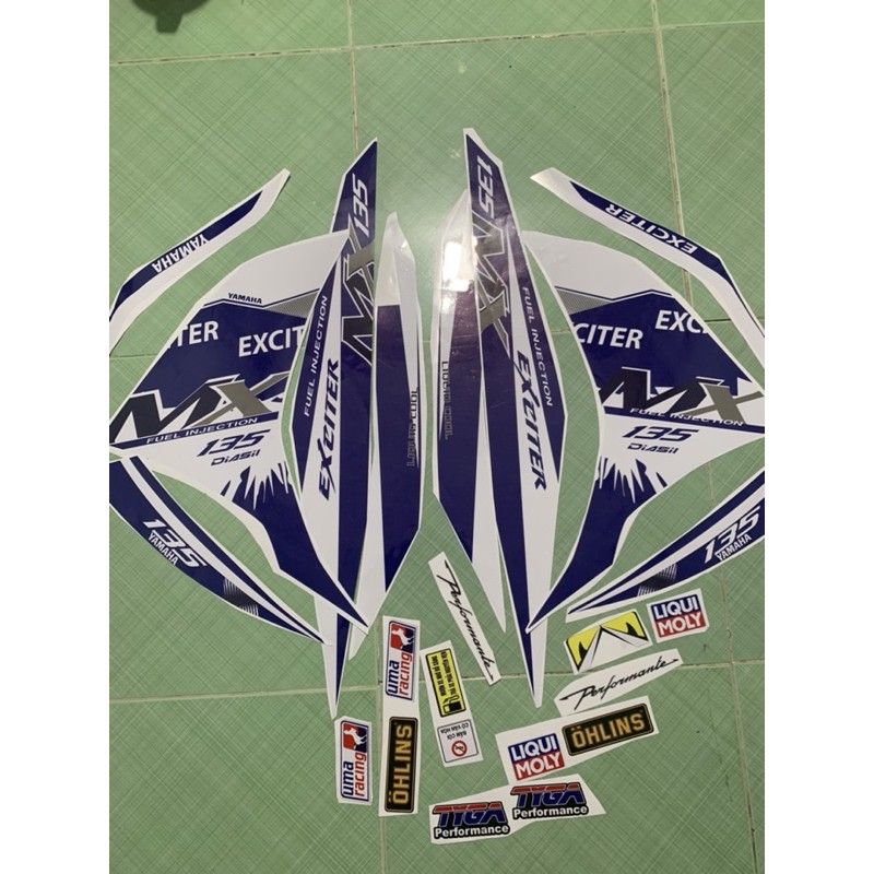 Tem exciter 135 MX xanh trắng