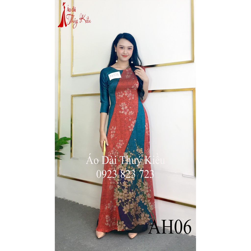 Áo dài Đông Hưng nền xanh đỏ gân chìm in hoa hồng AH06