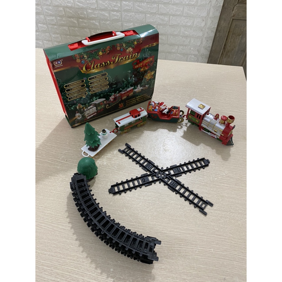 Đồ chơi tàu hoả ông già noel chạy trên đường ray