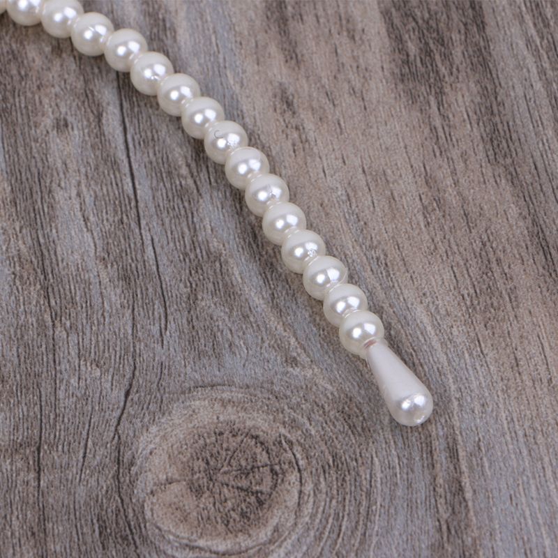 Thun cột tóc gắn ngọc trai sáng tạo