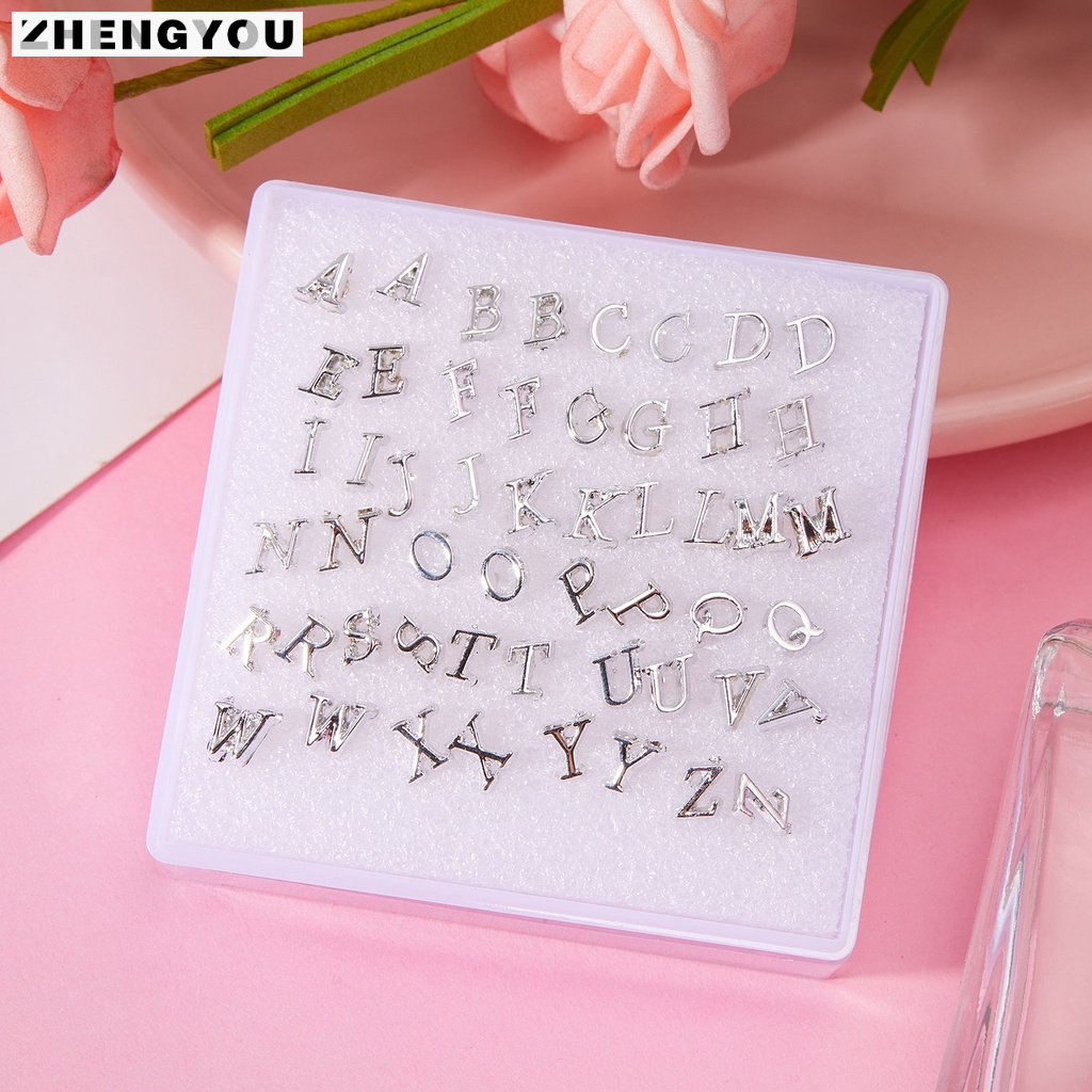Set 26 cặp bông tai Rinhoo họa tiết 26 chữ cái cá tính màu đen bạc