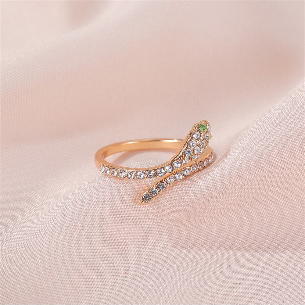 Serpentine Zircon Diamond Rings