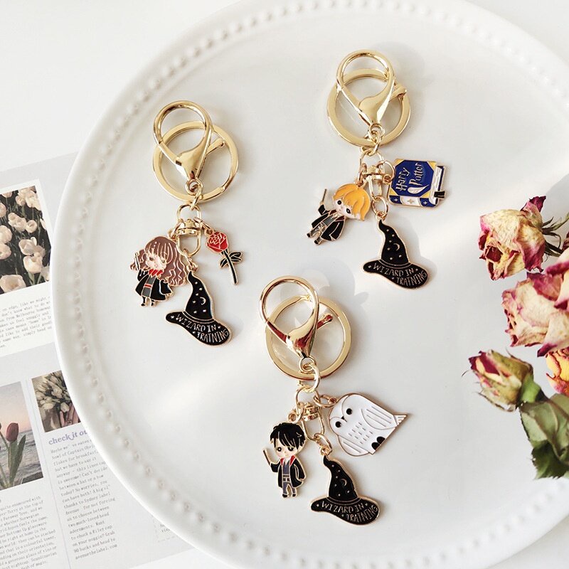 Móc Khóa Hình Quyển Sách Ma Thuật Bằng Hợp Kim