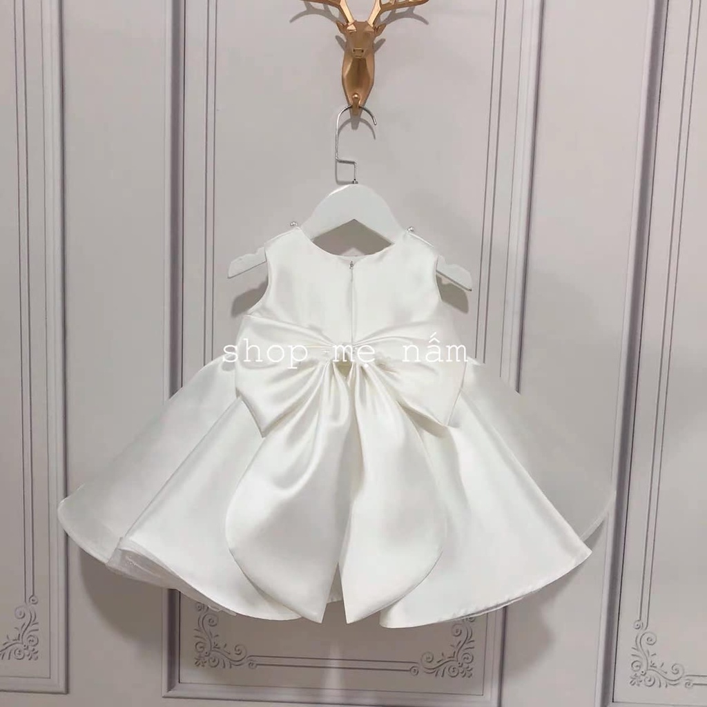 Váy trắng nơ 4 cánh