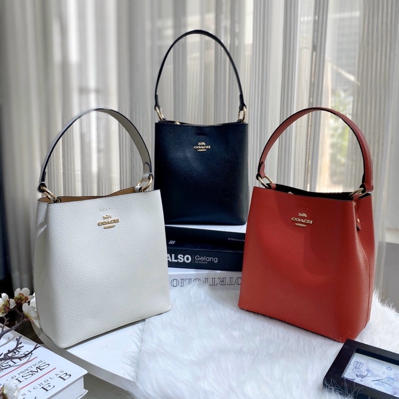 Túi đeo vai kèm dây đeo chéo Co@ch bucket