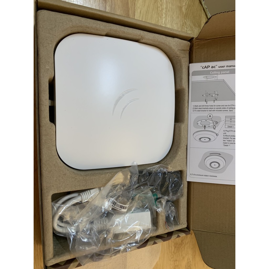 Router MikroTik cAP ac RBcAPGi-5acD2nD Gigabit không dây hai băng tần