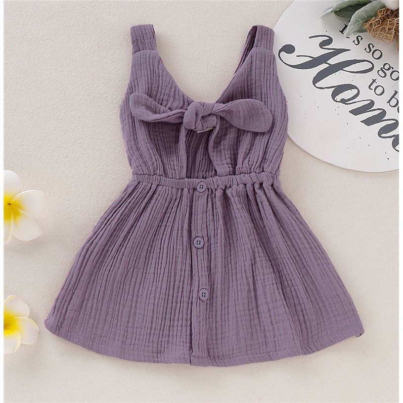 Đầm MIKRDOO cotton sát nách đính nơ thắt xinh xắn dành cho bé gái