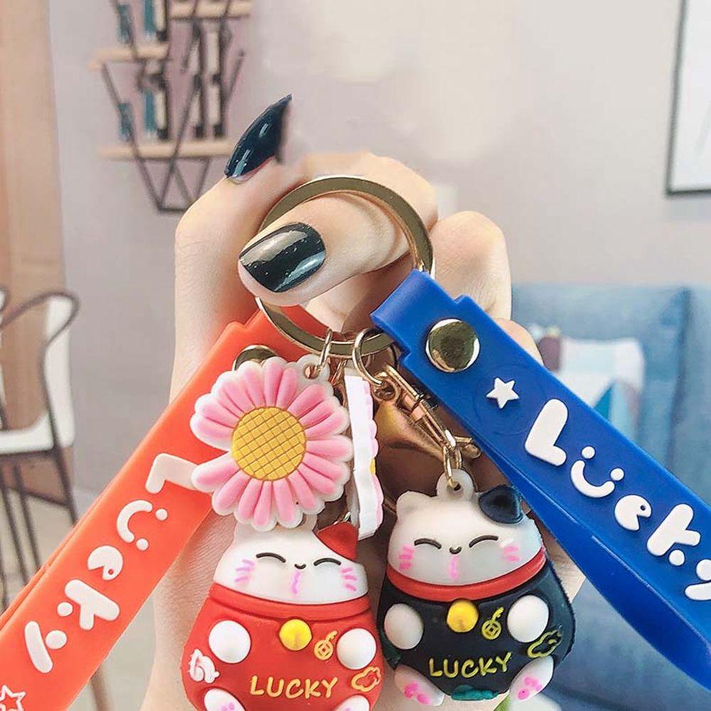 Móc Khóa Hình Chú Mèo May Mắn Và Hoa Cúc Đỏ Dễ Thương