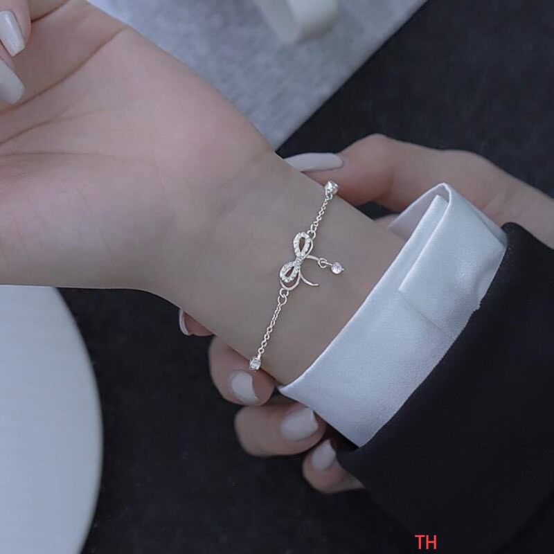 lắc tay nơ bạc chuẩn Mc