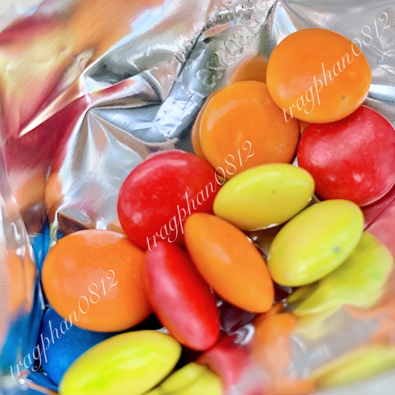 Kẹo socola sữa viên sắc màu Pop it Doraemon (gói 12g)