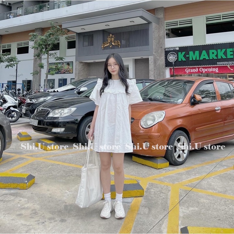 Áo váy trắng babydoll xếp ly bèo ngực dáng dài dấu quần áo kiểu nữ ngắn tay