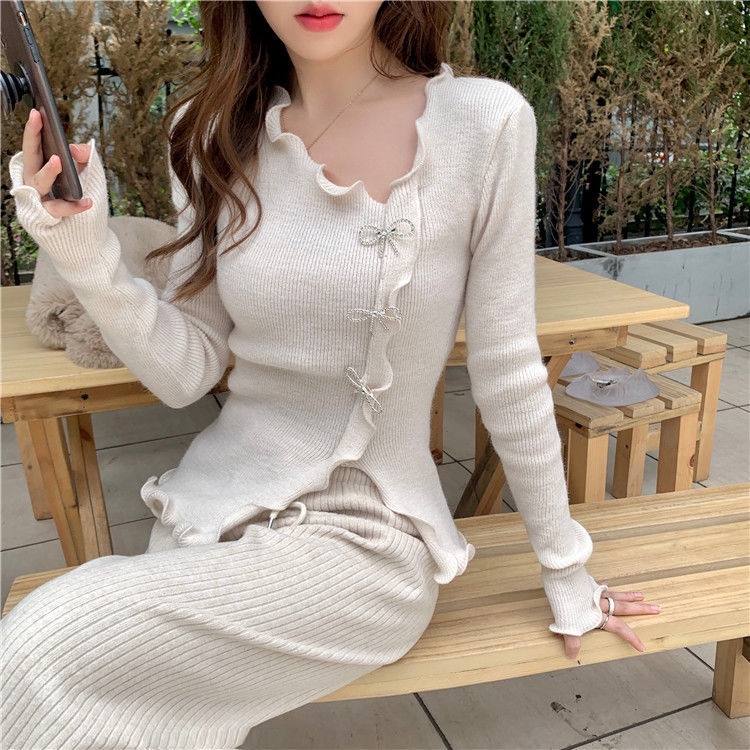 Áo len nữ cổ chữ v phối nơ thời trang