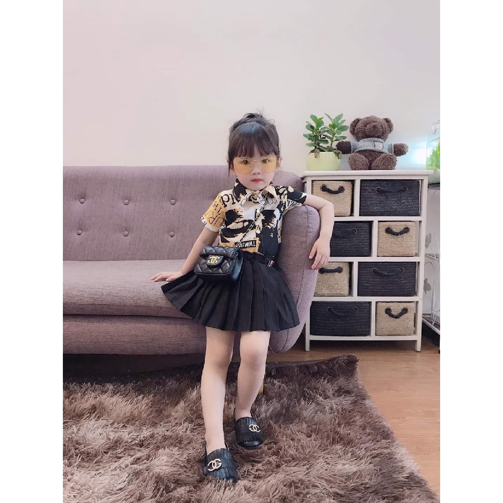 Váy bé gái gồm áo sơ mi và chân váy đen xếp ly XHN231