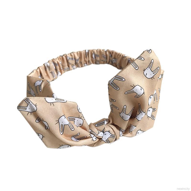 Băng đô nơ chấm bi dễ thương cho bé gái