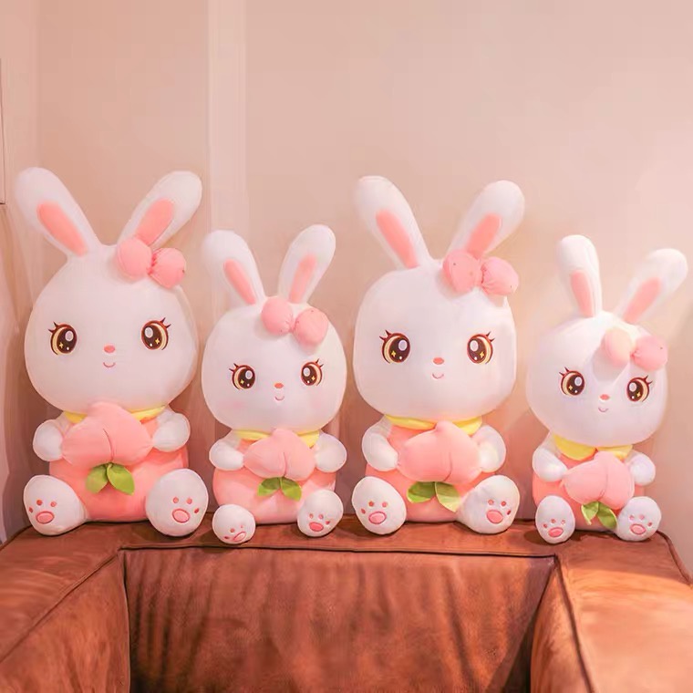 CÓ SẴNGấu bông thỏ trắng ôm đào dễ thương kích thước 40-55cm