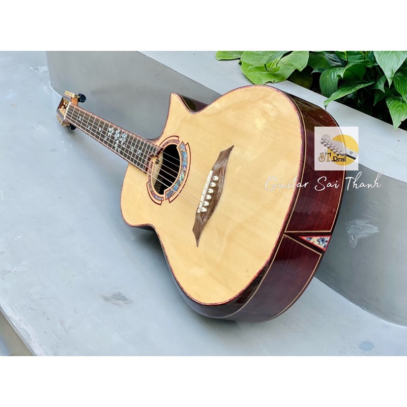 Đàn guitar custom cẩm ấn khảm xà cừ có lắp EQ