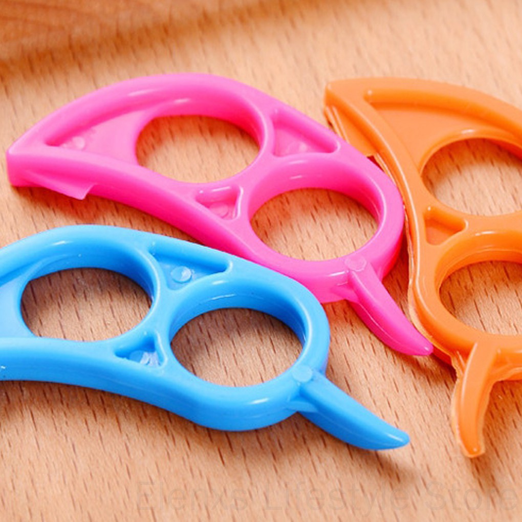 Dụng cụ xỏ ngón tay lột vỏ cam bằng nhựa