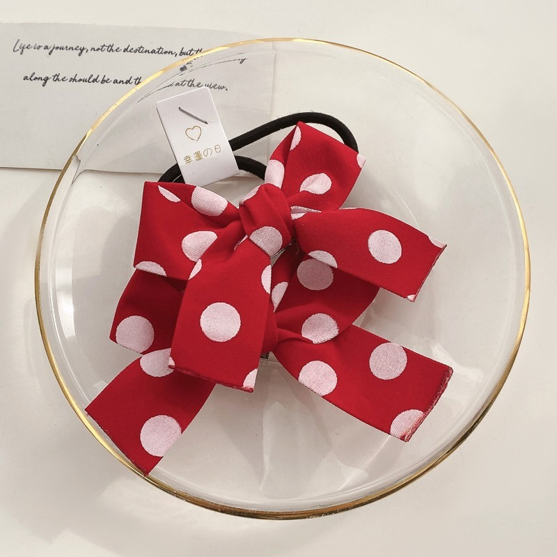 Thun cột tóc gắn nơ dễ thương phong cách Hàn Quốc