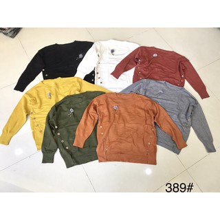 G11. 389. áo len khuy sườn cài ngực