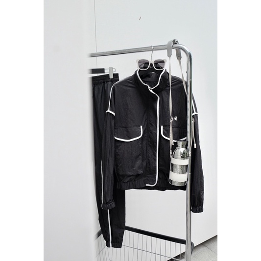 Set bộ thể thao nữ gồm áo khoác gió và quần dài bo gấu thương hiệu Balenciaga cao cấp