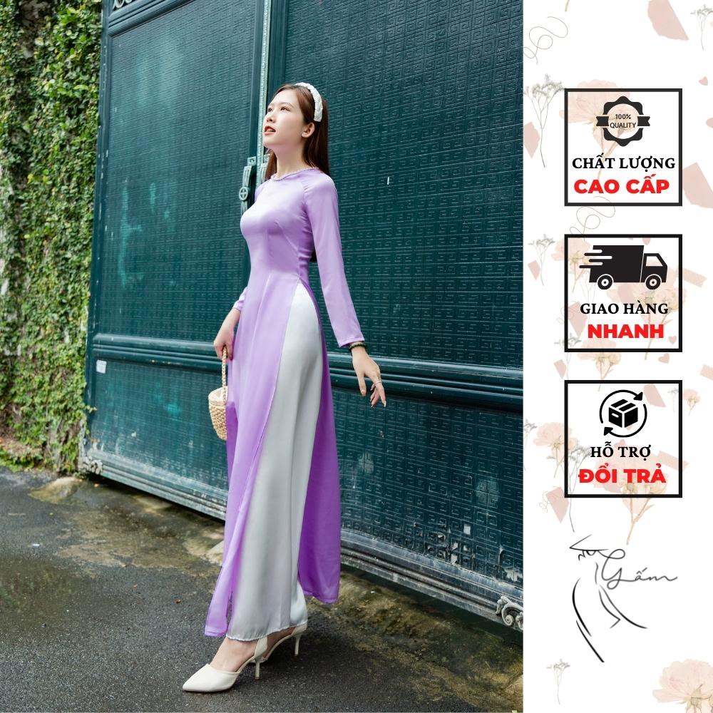 Áo dài lụa ngọc trai màu tím pastel nhẹ nhàng, không cổ viền đính hạt trai thanh lịch và cuốn hút phù hợp đi sự kiện