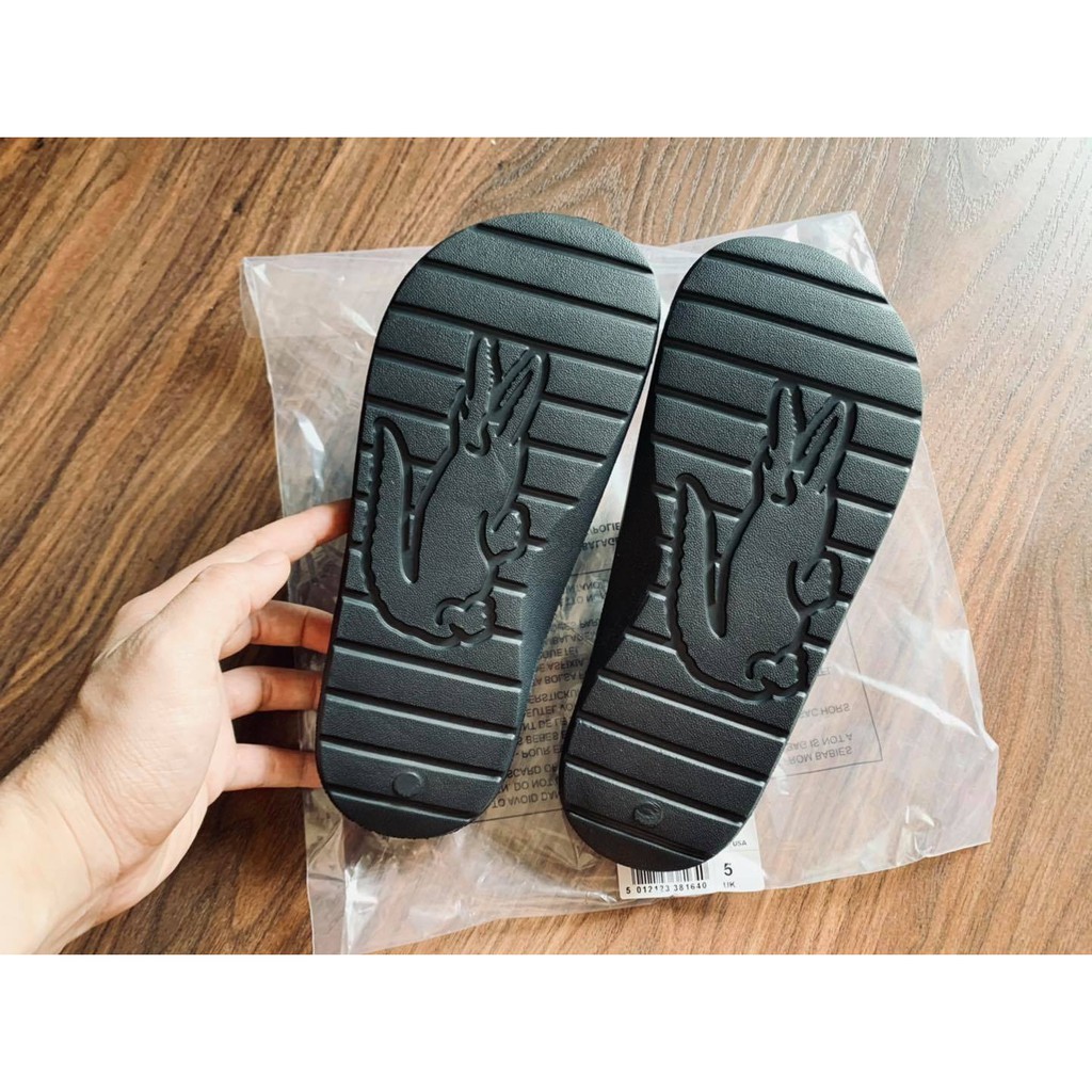 Dép đúc đen in cá trắng