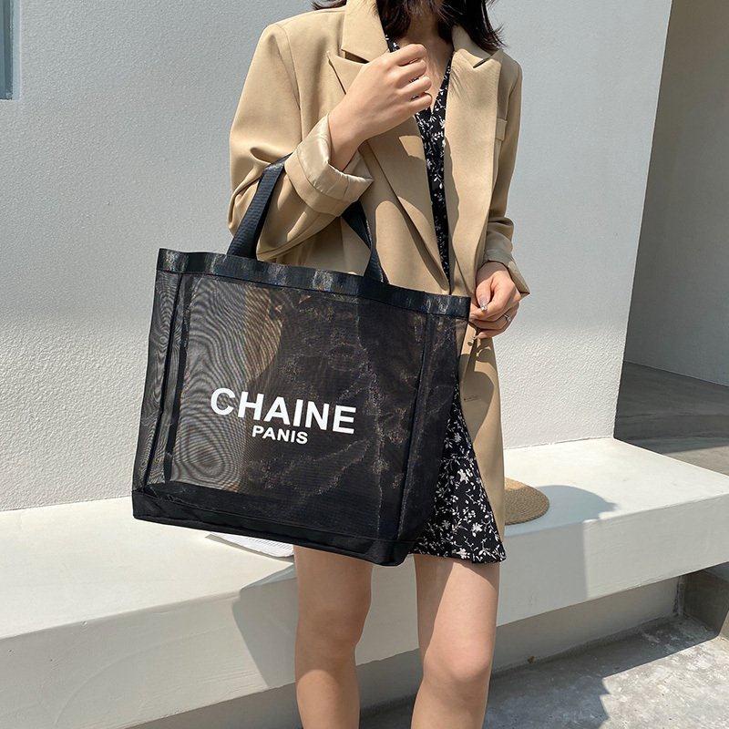 Túi lưới đựng mỹ phẩm in chữ cái màu trắng và đen phong cách Âu Mỹ thanh lịch sành điệu