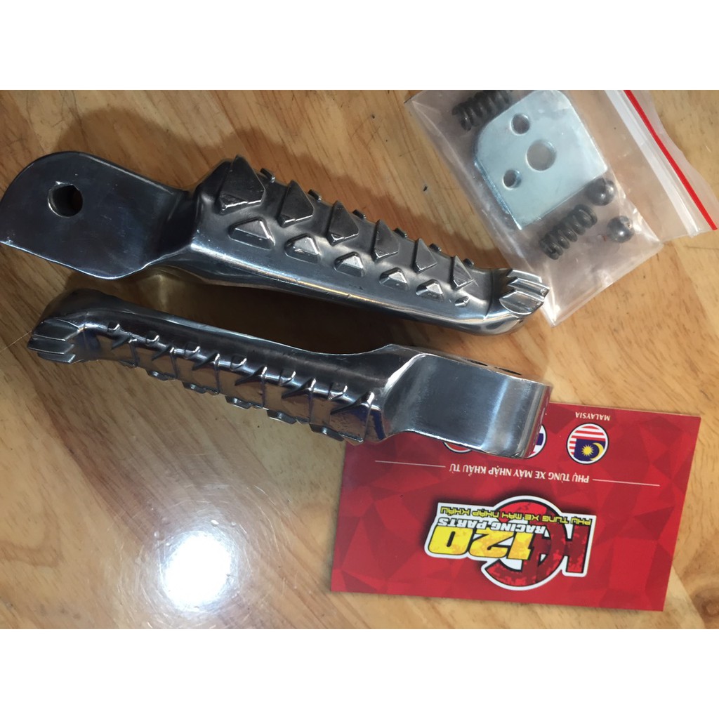 Gác chân nhôm sau xương cá raider-honda