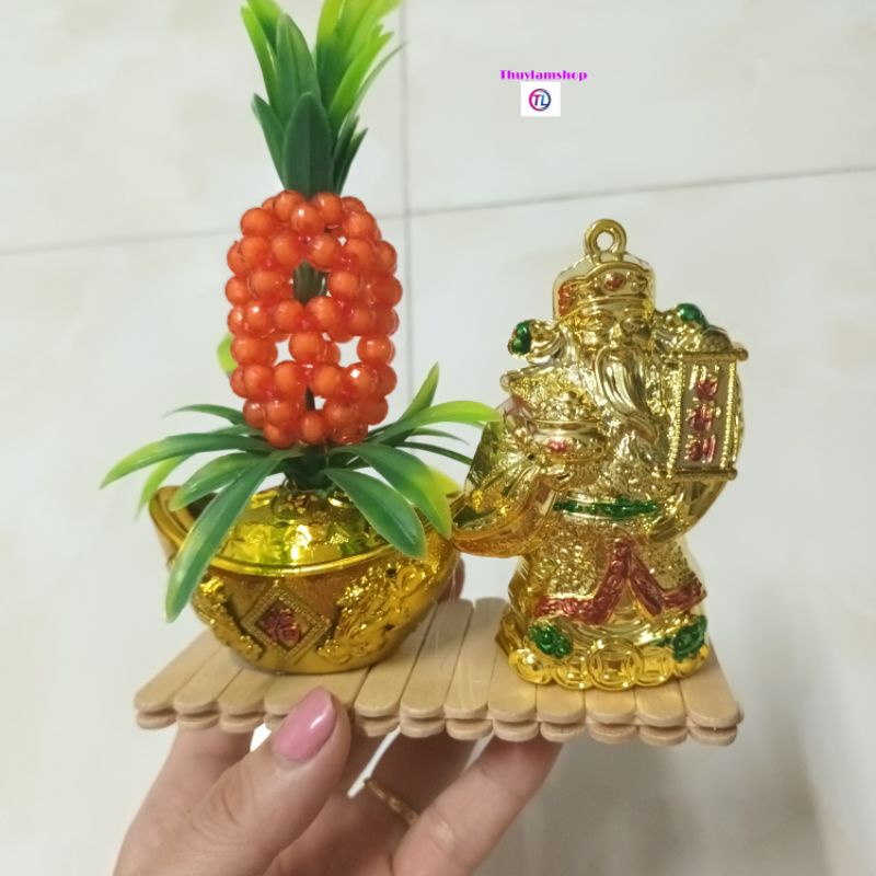 Tượng ông Thần Tài thỏi vàng trái thơm kích hoạt may mắn tài lộc