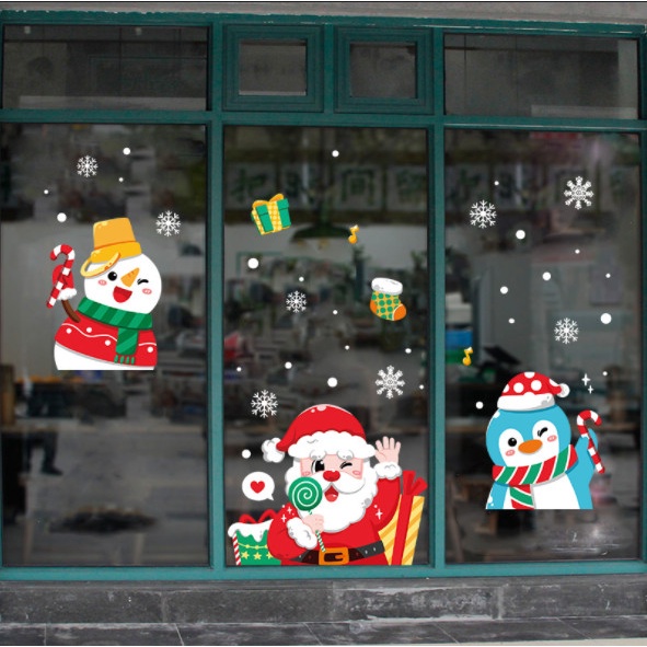 Decal dán tường Noel Hít Tĩnh Điện không Dơ Kính - Noel cầm kẹo đón giáng sinh