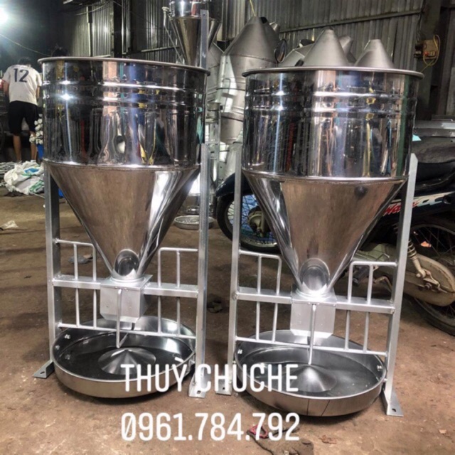 Máng lắc tự động cho heo ăn 2 bao