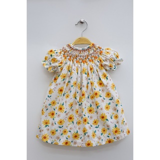 Đầm smock cúc vàng