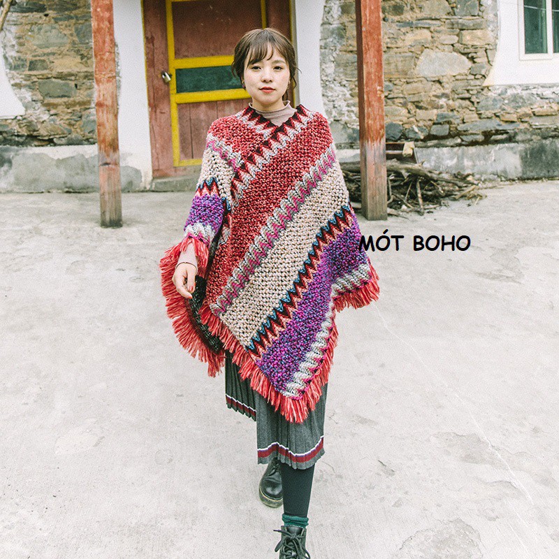 Áo poncho thổ cẩm, tua rua đỏ cam