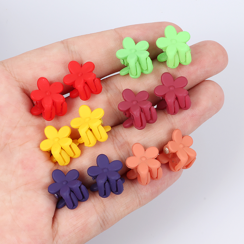 Kẹp tóc nhựa hình hoa trang trí xinh xắn cho nữ