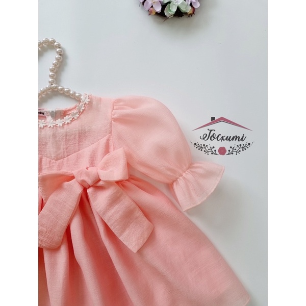 Váy công chúa nơ hồng cam cực ngọt ngào cho bé - Tocxumi
