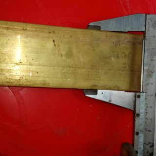Thanh đồng vàng dài 10cm rộng 5cm dày 1cm.