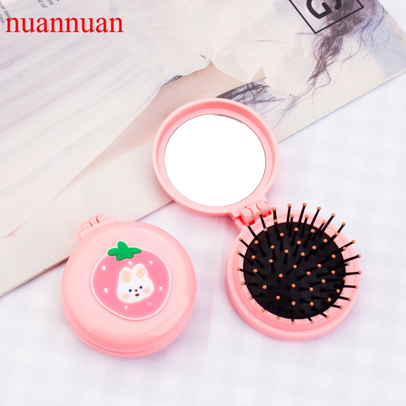 Lược nhựa chải tóc mát xa da đầu có gương trang điểm tiện lợi