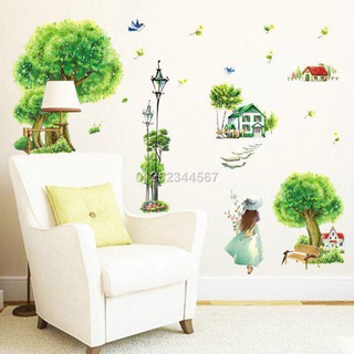 Decal tranh dán tường cây xanh và cô gái