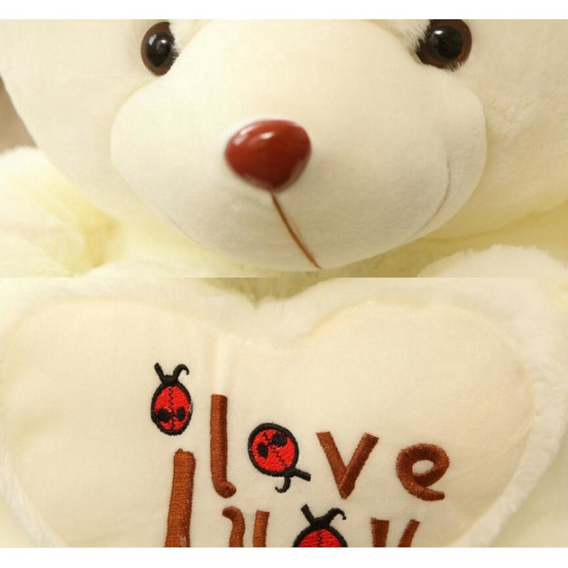 Gấu Teddy nhồi bông cầm trái tim chữ I Love You đáng yêu