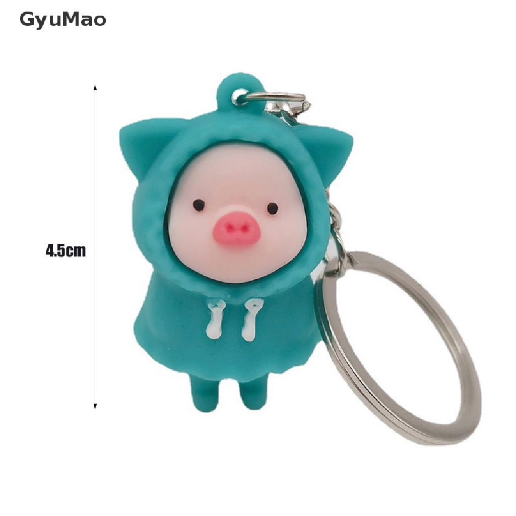 Móc khóa gắn hình chú heo con mặc áo mưa dễ thương