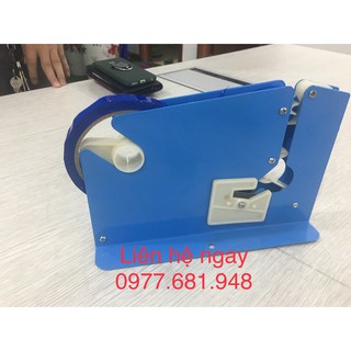 Máy buộc đầu túi nilong trong siêu thị, máy buộc miệng túi, máy buộc túi nilon