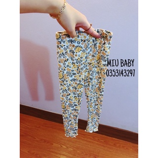 Quần legging hoa vàng xuat du bé gái