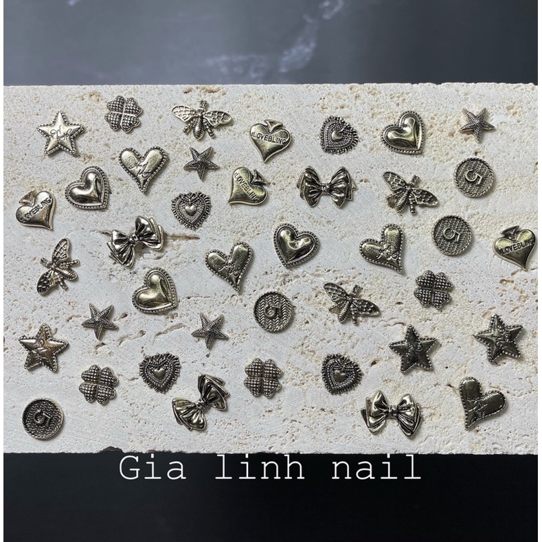 Charm set gấu nơ ( y hình )